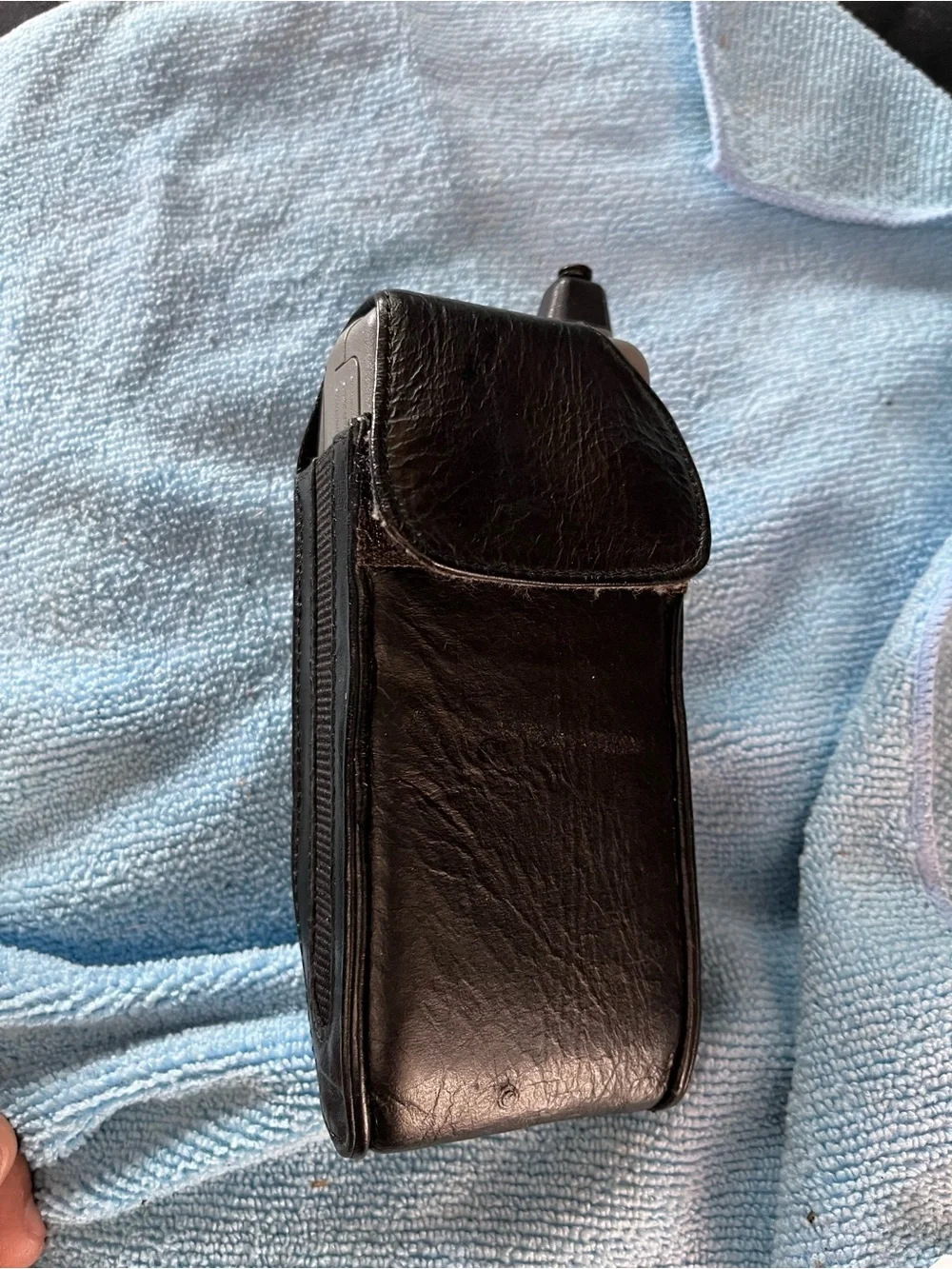 Motorola Silver Flip Phone with Numeric Keypad and Antenna